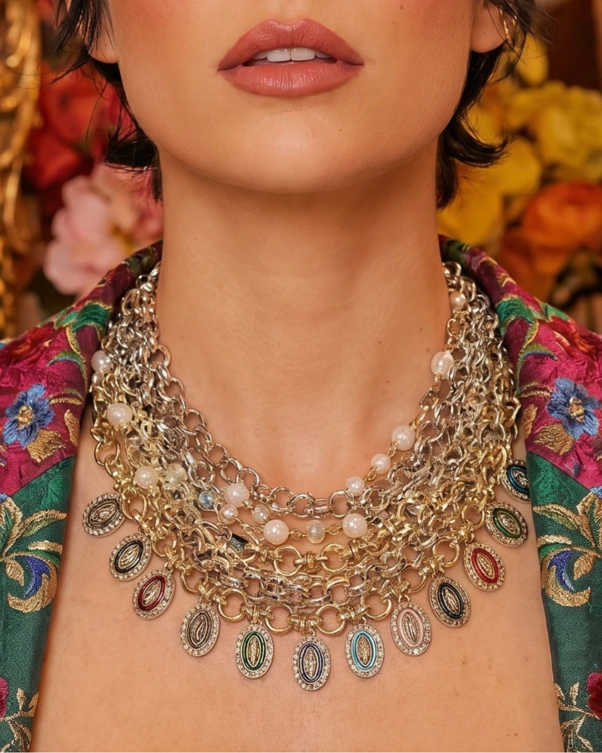 Woman wearing a decorative necklace with a floral background