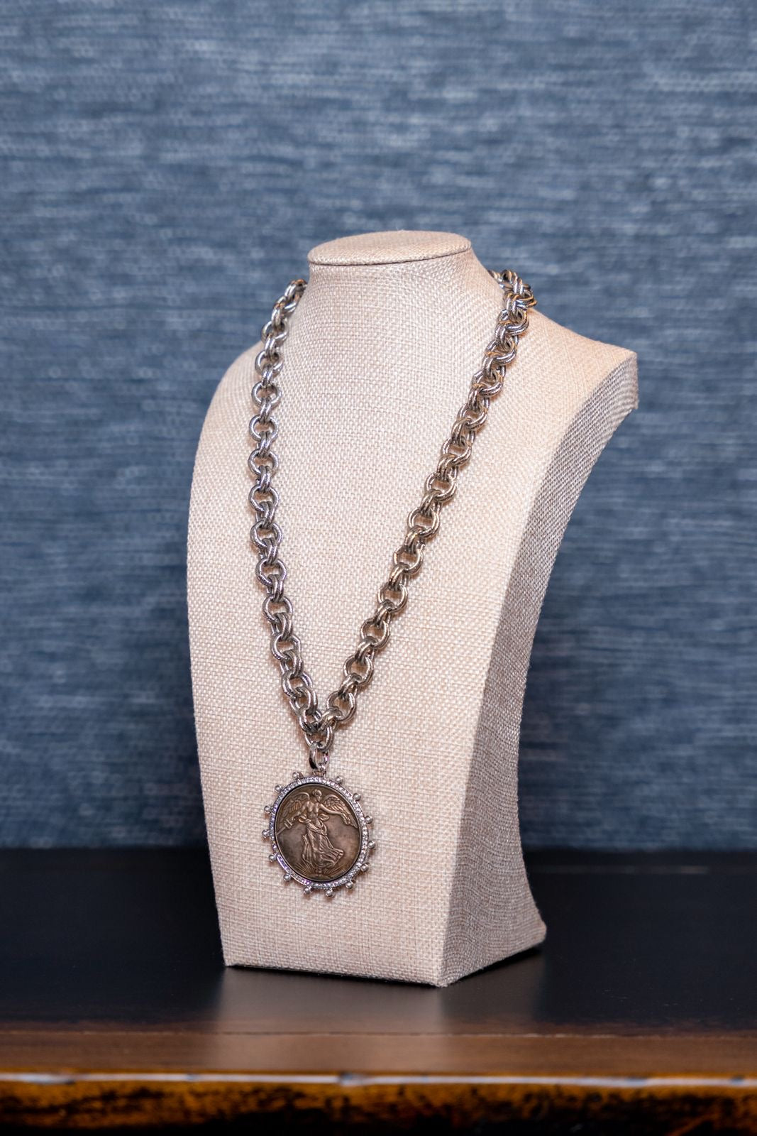Silver Medallion Necklace with Angel Motif