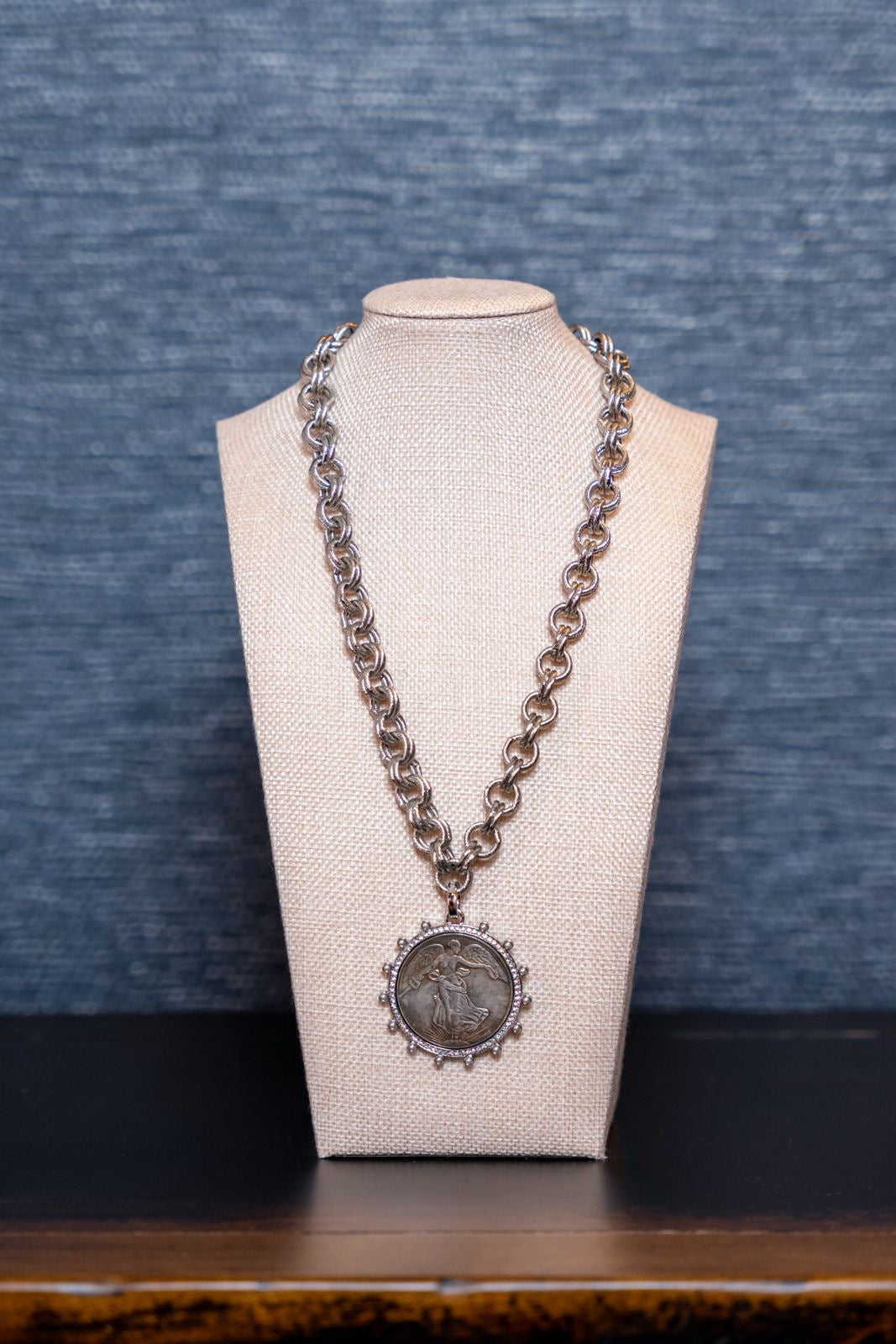Silver Medallion Necklace with Angel Motif